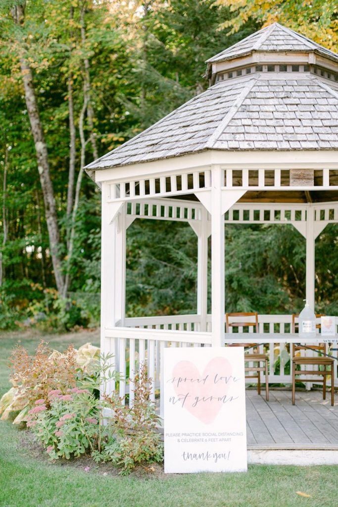 Spread love not germs wedding sign